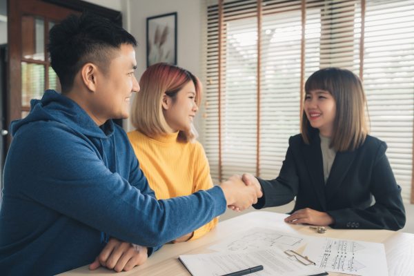 Couple consulting with Catalyst Immigration specialist on Singapore PR application.